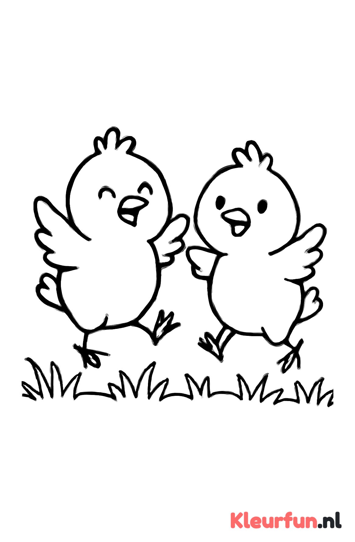 Paaskuikentjes die in het gras springen
