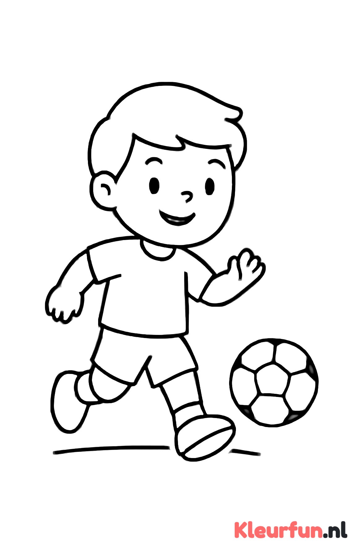 Jongen trapt voetbal