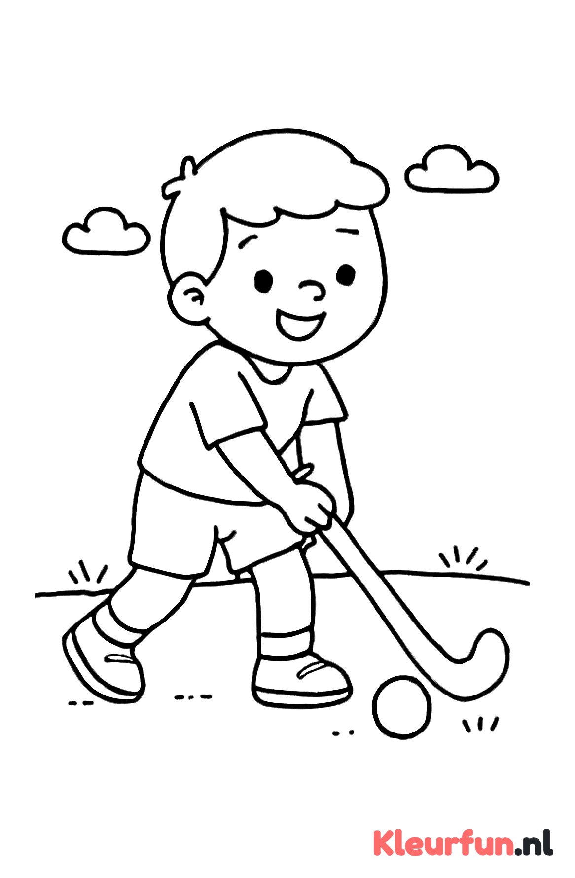 Kleuter slaat hockeybal